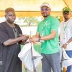 Farm Right Foundation -Director of Finance making a donation